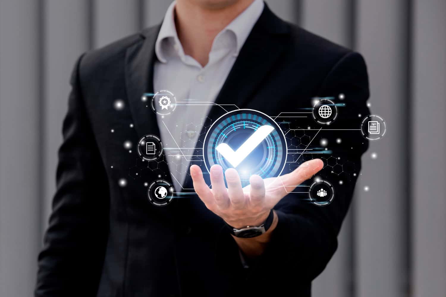 An image of a business man holding a glowing tick